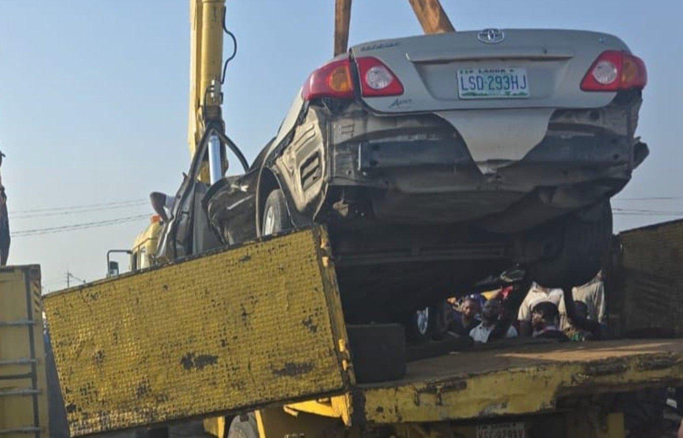 Driver Rescued After Container Truck Falls on Car in Lagos